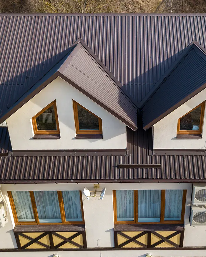 attic rooms exterior on metal shingle roof