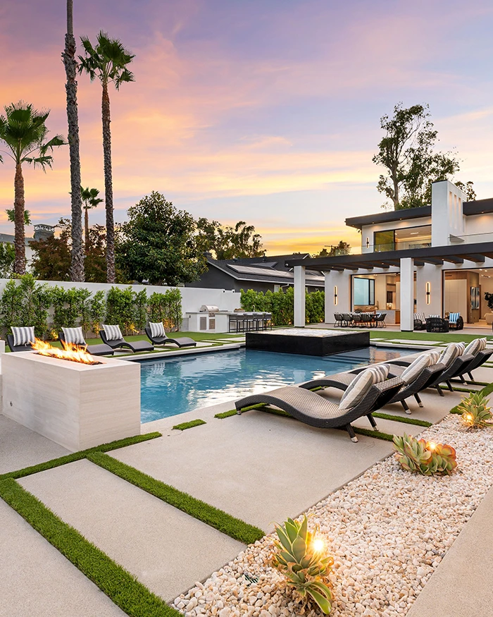 backyard with swimming pool and poolside deck