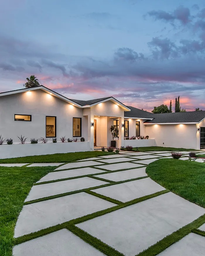 concrete driveway with artificial turf combined in San Diego