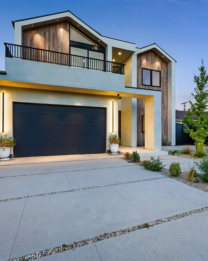driveway and landscaping on the front yard of a house