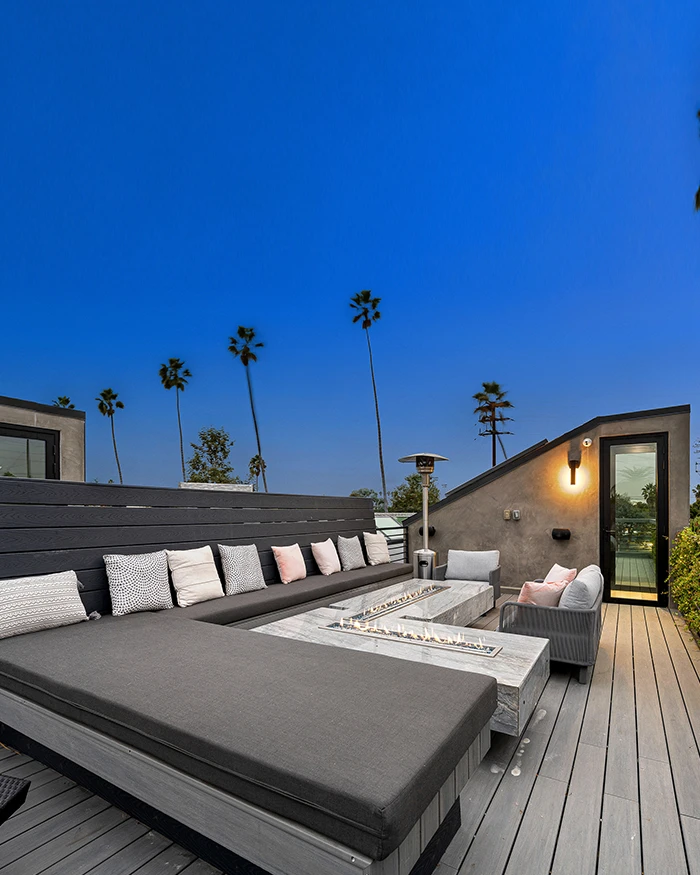 outdoor deck with inclined chair and side table