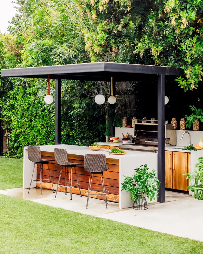 outdoor kitchen with bar area